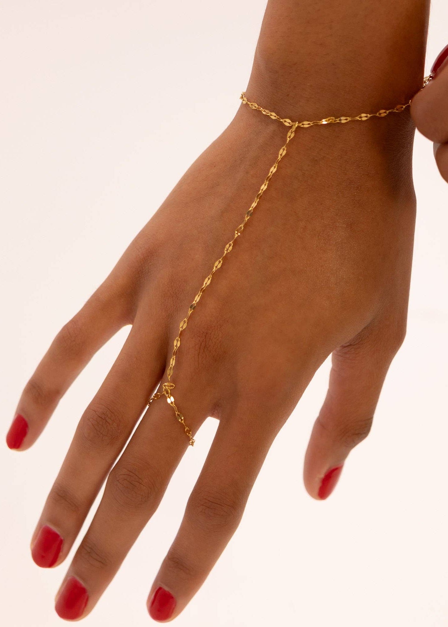 Steel Lip Hand Chain: Gold