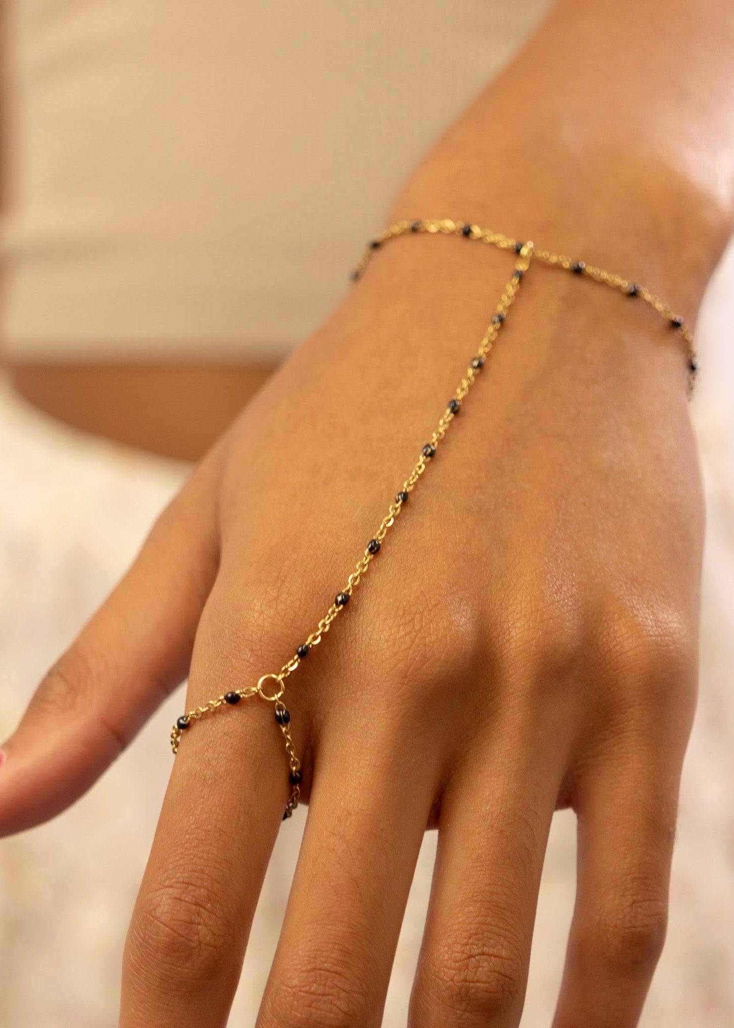 Black Beaded Hand Chain: Gold